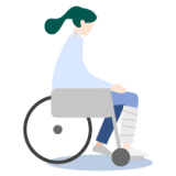 車椅子に乗る人